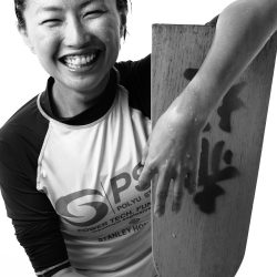 A photo by Marie Yip, titled, "Dragon Boat Racer and her Sweat"